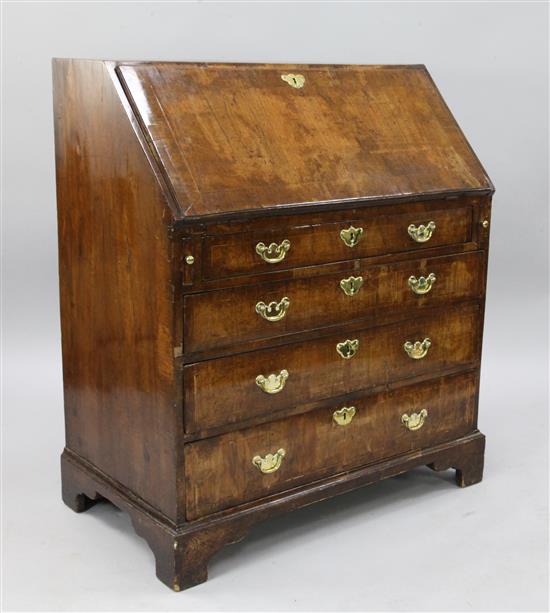 A George I walnut bureau, W.2ft 11in. D.1ft 8in. H.3ft 4in.